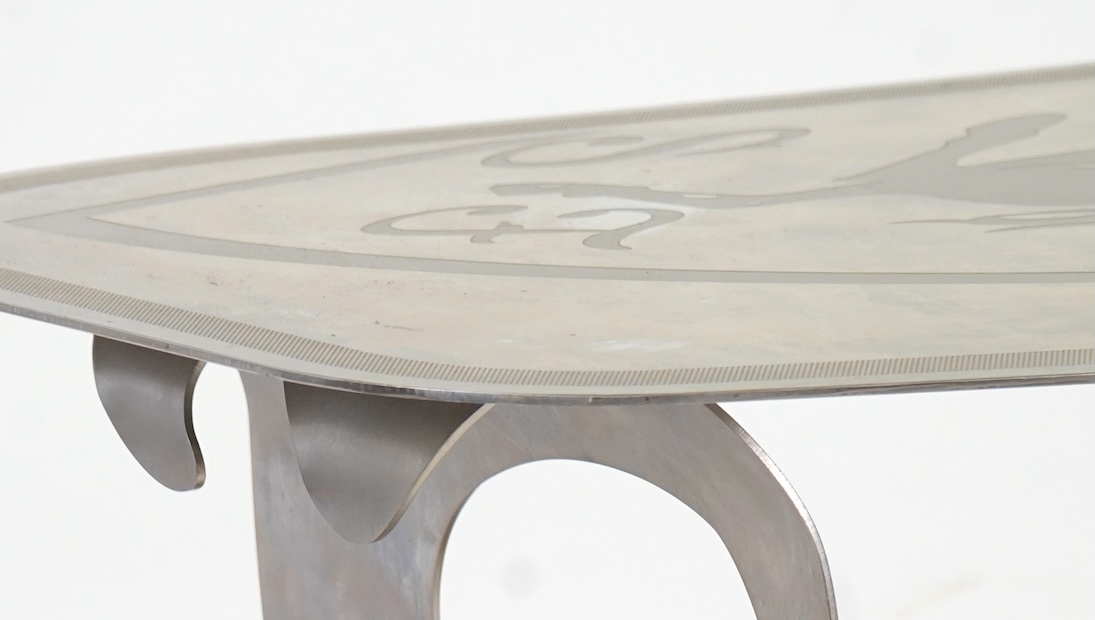Pietro Psaier (Italian 1939-2004) A Ferrari polished steel coffee table, 1 of 3, in homage to Carlo Mollino